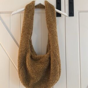 Anthropologie Tan furry hobo bag